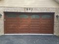 brown double door with four arched glass windows